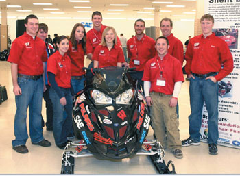 The zero-emissions portion of the Clean Snowmobile Challenge was won by the University of Wisconsin Madison. Their sled uses a Delphi electric motor (once used by General Motors in its EV1 electric car) powered by eighty-four 28-volt lithium-ion batteries and is capable of running up to 20 miles on a single charge.  